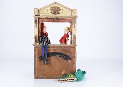 Lot 417 - A late 19th century German toy Punch & Judy puppet booth