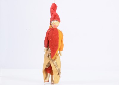 Lot 419 - An 19th century Grodnertal dolls’ house wooden Polchinello puppet
