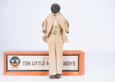Lot 425 - An unusual 19th century black shoulder-head boy doll