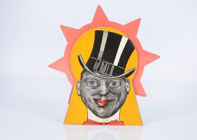 Lot 427 - An early 20th century printed head of a black man wearing a top hat