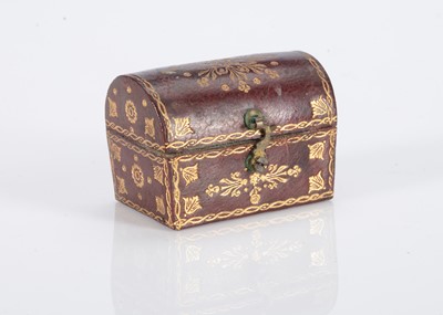 Lot 436 - An early 19th century miniature brown leather trunk
