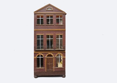 Lot 440 - A large early 19th century English wooden town dolls’ house