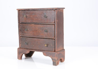 Lot 442 - A rare mid 19th century unmarked John Bubb dolls’ house chest of drawers