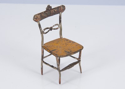 Lot 445 - A rare 19th century dolls’ house pewter chair