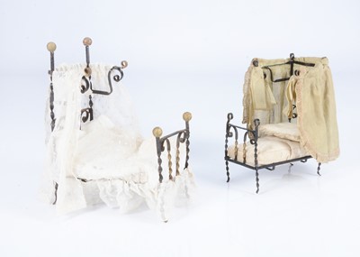 Lot 457 - Two similar wrought iron dolls’ house half-tester beds