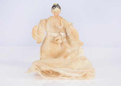 Lot 459 - An 19th century Grodnertal wooden dolls’ house doll
