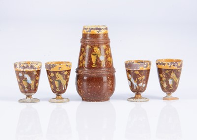 Lot 462 - A set of 19th century German turned wooden beer jug and four goblets