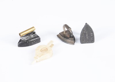 Lot 469 - Three dolls’ house flat irons
