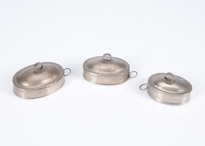 Lot 471 - Three 19th century English tinplate dolls' house meat covers