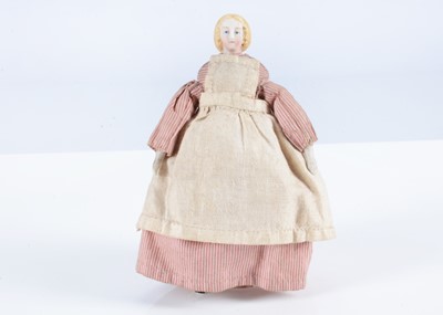 Lot 477 - An 19th century German bisque shoulder-head dolls’ house doll