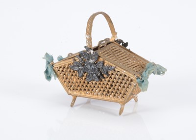 Lot 490 - A late 19th century German soft metal dolls’ house sewing basket