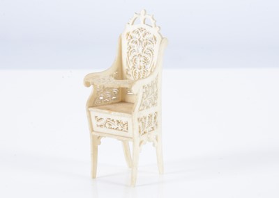 Lot 495 - An 19th century bone dolls’ house highchair