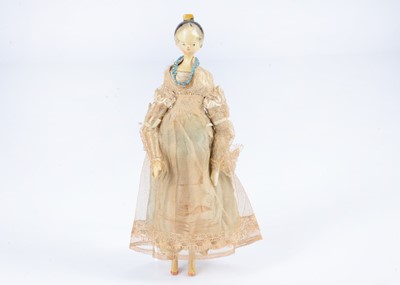 Lot 498 - An 19th century Grodnertal wooden doll