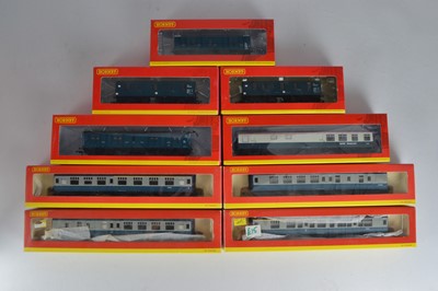 Lot 200 - Hornby (China) boxed 00 Gauge BR Mk 1 blue and grey coaches and four blue Parcels Utility Vans (9)