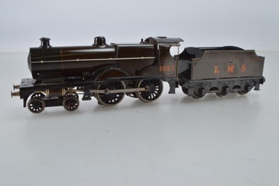 Lot 579 - Bassett Lowke O Gauge 4-4-0 locomotive and tender, LMS brown Compound, No 1063