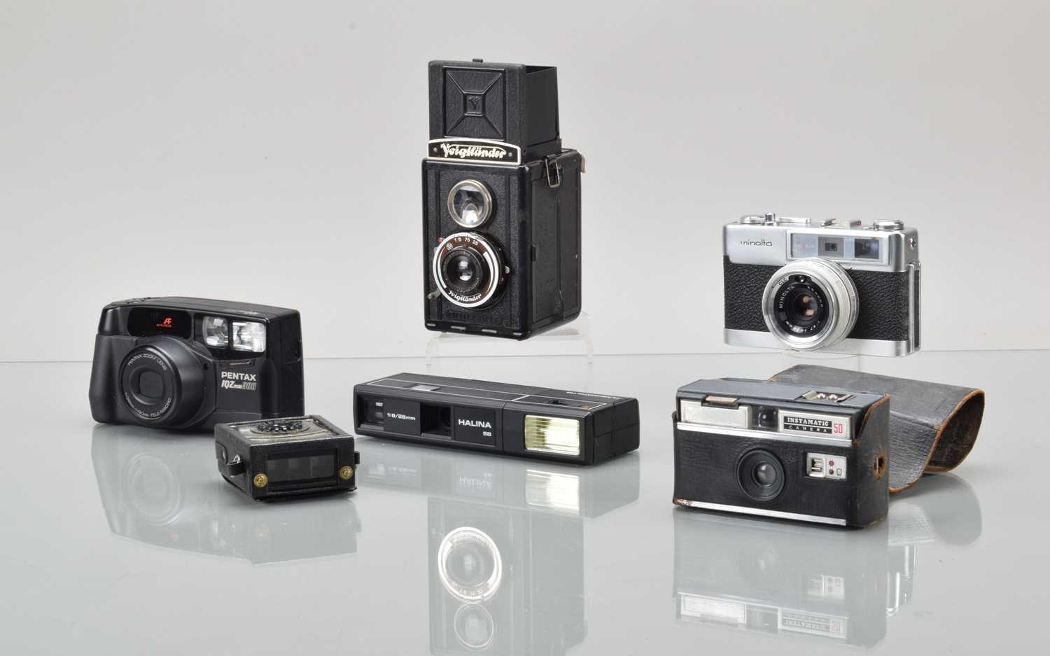 Lot 59 - A Group of Film Cameras