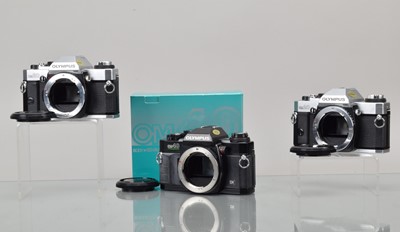 Lot 90 - Three Olympus SLR Camera Bodies