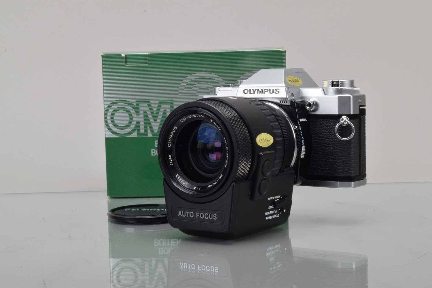 Lot 91 - An Olympus OM-30 SLR Camera