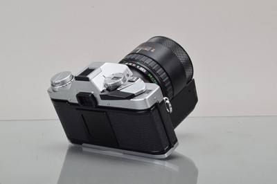 Lot 91 - An Olympus OM-30 SLR Camera