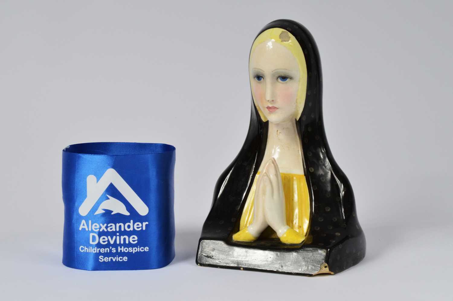 Lot 7 - A Lenci pottery praying Madonna