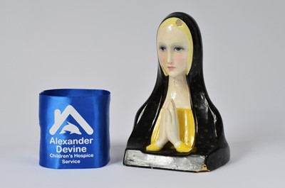 Lot 7 - A Lenci pottery praying Madonna