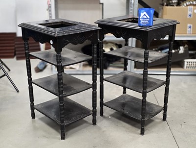 Lot 84 - A pair of lightly carved ebonised side tables