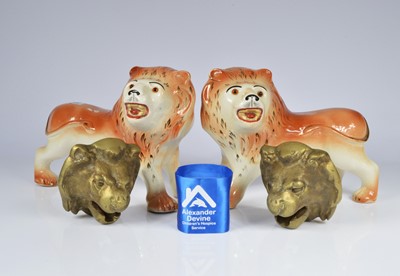 Lot 89 - Pair ceramic lions, pair brass lion knockers