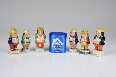Lot 120 - Six Staffordshire pottery figural items