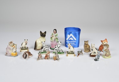 Lot 135 - A collection of ceramic cats