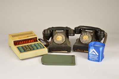 Lot 164 - Two Bakelite telephone handsets