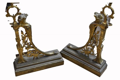 Lot 95 - A pair of Neoclassical ornate firedogs