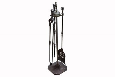Lot 97 - A vintage fireplace companion set