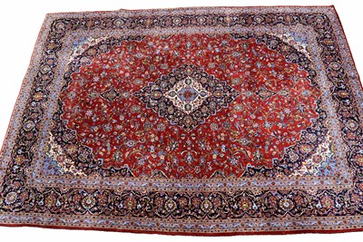 Lot 102 - A large machine made Kashan Carpet