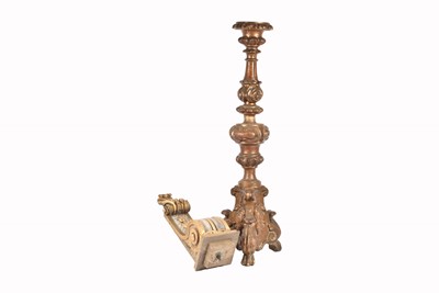 Lot 108 - A floor standing carved wooden candle/torch holder