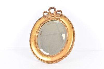 Lot 333 - A small overall gilt framed wall mirror