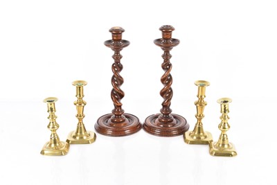 Lot 334 - A pair of Barley Twist wooden candlesticks
