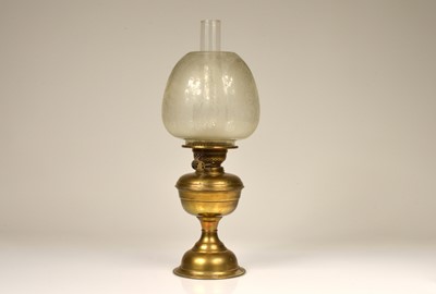 Lot 338 - A brass oil lamp