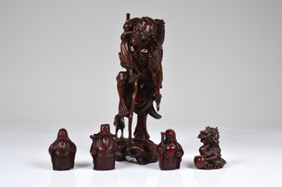 Lot 439 - A hand carved Chinese wood figure
