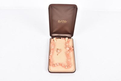 Lot 447 - A 14kt Gold & Coral Necklace and Earring Set