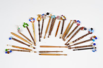 Lot 460 - A collection of twenty five wooden lace bobbins