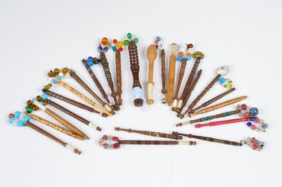 Lot 464 - A collection of twenty five wooden lace bobbins
