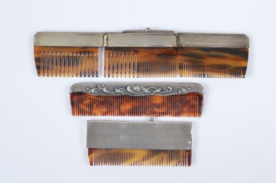 Lot 478 - Three silver mounted combs