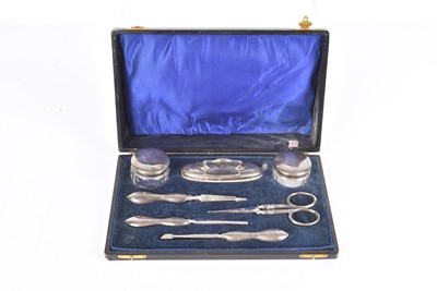 Lot 482 - An early 20th Century silver hallmarked manicure set by William Devenport
