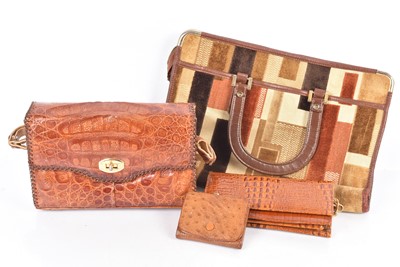 Lot 498 - A crocodile skin hand bag