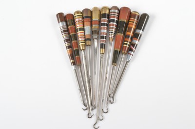 Lot 501 - A collection of Art Deco button hooks