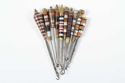 Lot 502 - A collection of Art Deco button hooks