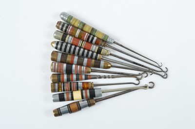 Lot 505 - A collection of Art Deco button hooks
