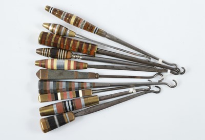 Lot 507 - A collection of Art Deco button hooks