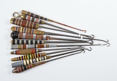 Lot 508 - A collection of Art Deco button hooks