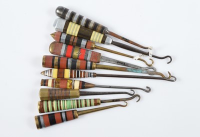 Lot 509 - A collection of Art Deco button hooks